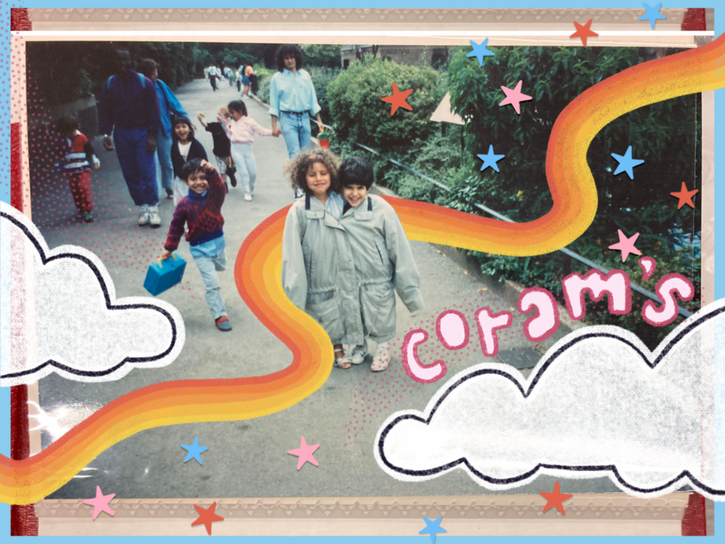 Illustrated image of two young children walking down a park pathway, wearing one oversized coat between the two of them